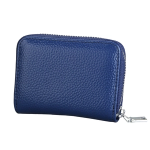 Detail view of deep blue pebble grain leather RFID wallet with silver zipper closure