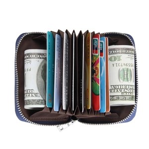 Detail view of the deep blue leather accordion wallet with multi-card slots and cash compartment