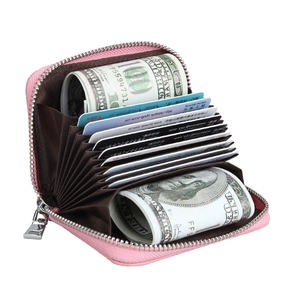 Pink leather accordion card holder with RFID blocking and large capacity for coins and cash