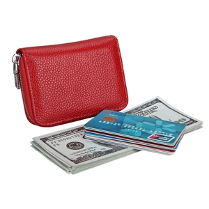 Detail of red lychee leather card holder with RFID protection and zip closure