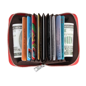 Macro view of red crossgrain leather card holder with RFID blocking and 10 accordion slots