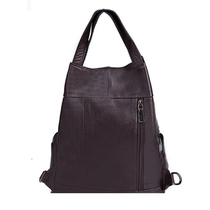 Front detail of dark brown pebbled leather backpack with vertical zipper pocket