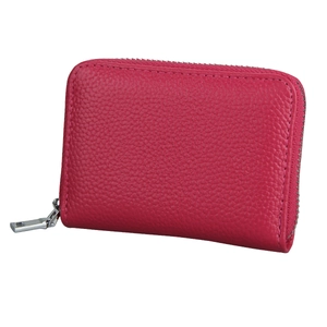 Detail of rose red genuine leather card holder with textured litchi grain and silver zipper
