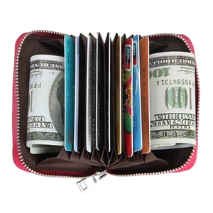 Detail view of open accordion leather card wallet with multiple slots and RFID lining