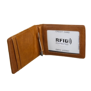 Detail of leather RFID wallet showing interior money clip and transparent ID window slot