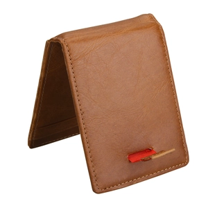 Detail of vintage brown leather RFID wallet with card pull tab and neat stitching