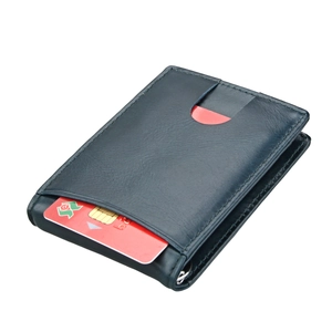 Detail of dark blue leather slim wallet with RFID slot and precision stitching