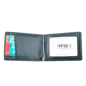 Detail of teal leather RFID wallet showing interior card slots and metal money clip
