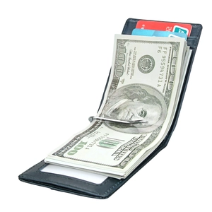 Detail of genuine leather money clip wallet with silver metal clamp and card slots