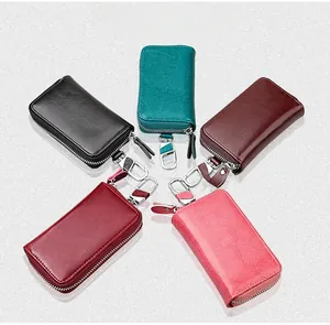 Genuine leather car key holders in five colors with metal zippers and swivel hooks