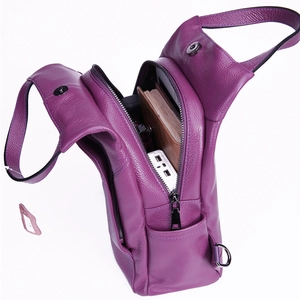 Purple genuine leather backpack with lychee grain showing large storage capacity