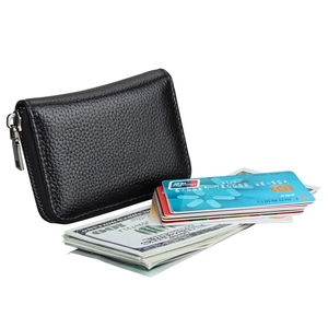 Close-up of black pebble leather RFID card holder with silver zipper and multi-slots