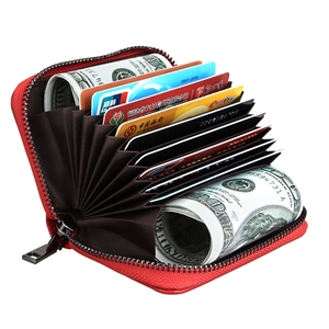 Macro view of red leather RFID card holder with multiple accordion slots and cash capacity