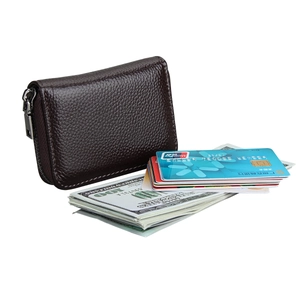 Macro detail of dark brown pebbled leather RFID card holder wallet with silver zipper