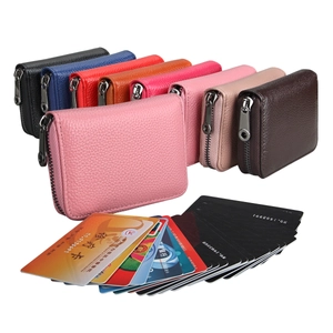 Detail view of multi-color leather RFID card holders with zip closure and accordion design