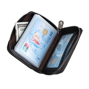 Detail view of leather RFID card holder interior with multiple PVC slots and zipper closure