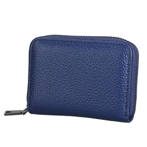 Detailed view of the navy blue pebbled leather card holder with secure metal zipper closure