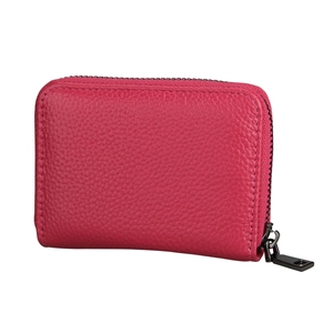 Close-up of red lychee pattern leather card holder with secure metal zipper closure