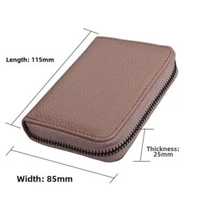 Detailed view of pink leather RFID card holder with dimensions 115mm by 85mm and 25mm