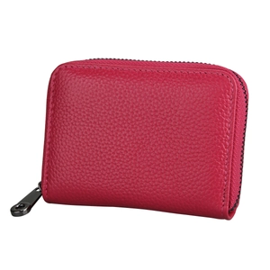 Detail of rose red lychee grain leather wallet with U-shaped zipper and metal puller