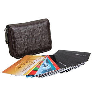 Close-up of brown litchi pattern leather card holder showing large storage capacity