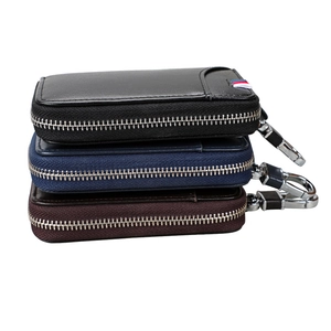 Estuche para llaves de cuero auténtico con cremallera y mosquetón en negro, azul y marrón