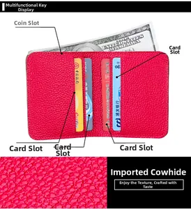 Detail of red lychee grain leather wallet showing internal cash slot and four card holders