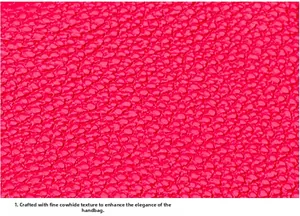 Macro shot of premium red lychee pattern leather texture on a compact wallet