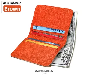 Detail of orange pebble leather wallet showing multiple card slots and cash capacity