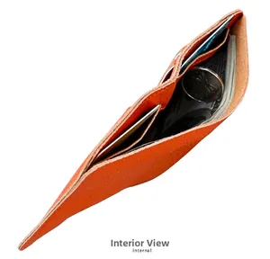 Detail view of orange leather wallet interior showing multiple card slots and coin pocket