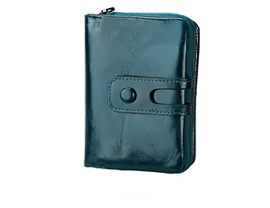 Detailed view of the teal vintage genuine leather RFID wallet with metal zipper