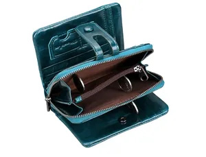 Detail of teal oil wax leather wallet featuring card slots and zippered coin pocket