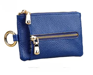 Front view of royal blue cowhide leather key pouch with gold zipper and litchi texture