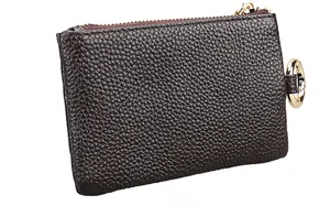 Detailed back view of a dark brown pebble leather key pouch with a gold zipper and metal ring