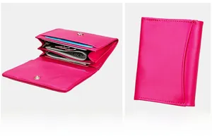 Detail of rose red genuine leather wallet with multiple card slots and snap closure