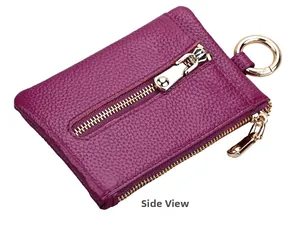 Side view of dark purple pebble grain leather key pouch with gold metal hardware details