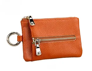 Brown litchi grain leather key case with golden metal zipper and spring ring clasp