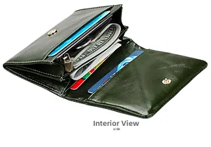Detail showing internal card slots and zipper coin pocket of green leather wallet