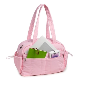Pink quilted travel bag with laptop compartment and multi-pocket design for fitness