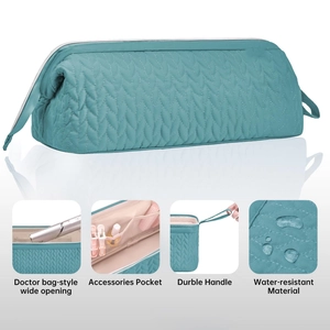 Teal quilted hair tool organizer bag with doctor-style wide opening and waterproof fabric