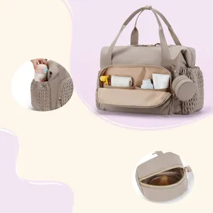 Sac à langer de voyage kaki avec rangement intérieur et pochette à tétine amovible