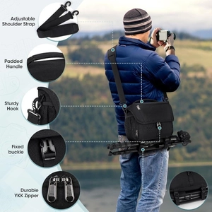 Detail of adjustable padded shoulder strap and durable metal hooks for the black pet bag