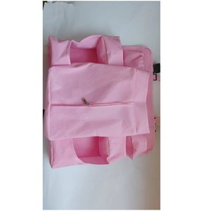 Pink hanging crib storage bag with side buckle and multiple utility pockets