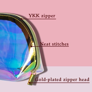 Holographic TPU cosmetic bag featuring a premium gold-plated YKK zipper and neat stitching