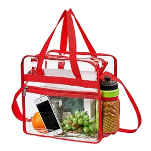 Détail du grand sac cabas transparent en PVC avec sangles rouges et poche filet latérale pratique