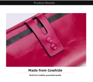 Detail of rose red cowhide leather wallet with precise stitching and snap buttons
