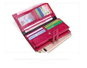 Detailed interior of a deep pink RFID leather wallet with card slots and phone pocket