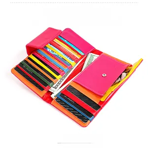 Interior detail of long multicolor leather wallet with many card slots and bill compartment