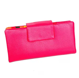 Front view of a long rose pink leather wallet with colorful interior stitching detail