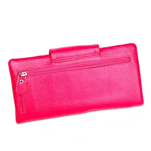 Detail view of the magenta leather long wallet back featuring a silver metal zipper pocket